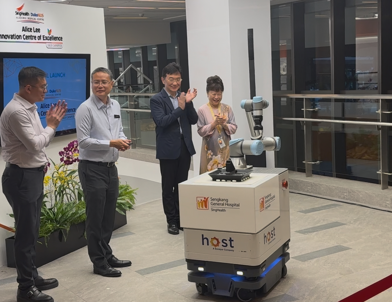 20251105 Empowering Healthcare AMR and Robot Arm Picture
